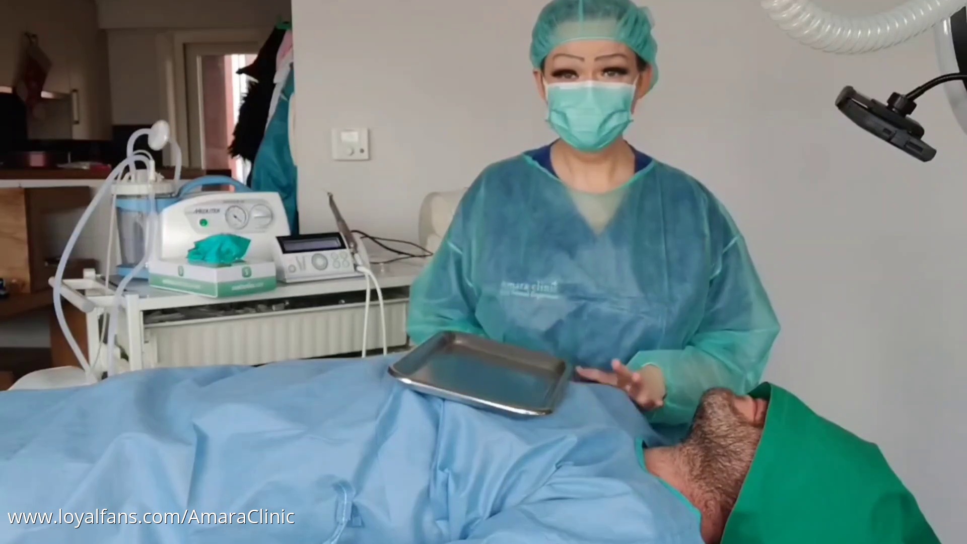 Dr Amara will examine the mouth of this patient with her beautiful gloved hands. First we will see how Dr Amara looks while doing her dental examination and then you get a close up look of her a